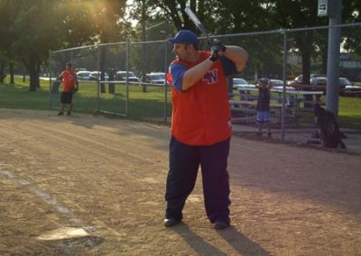 adults playing softball